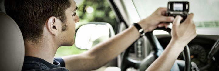 Man using a cellphone while driving